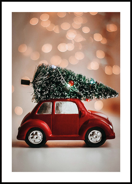 a red car with a christmas tree on top of it