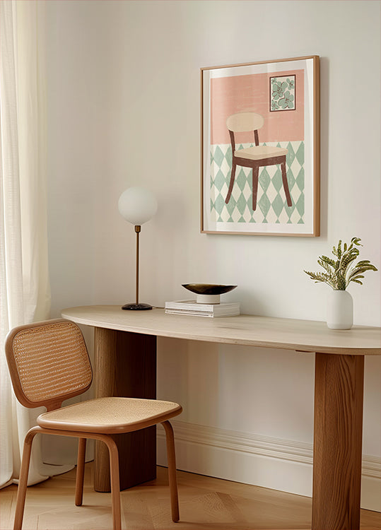 un rincón acogedor de una habitación con un escritorio de madera, una silla tejida, una lámpara y una obra de arte enmarcada que representa una silla sobre un suelo estampado.